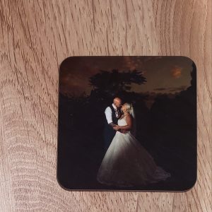 Square coaster with a custom photo of a bride and groom on their wedding day