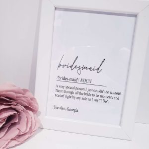 Definition script printed in crisp black on glossy white paper and in a white frame. Bridesmaid gift